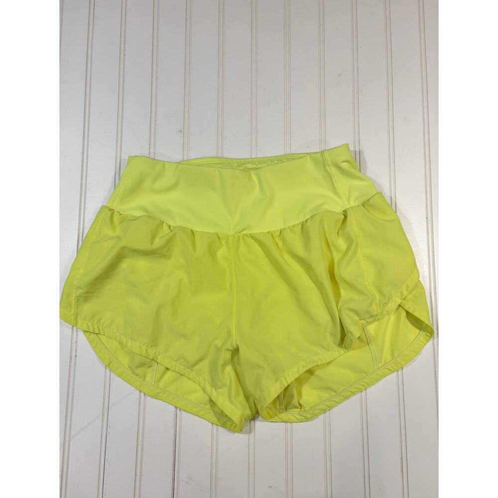 ￼ ATHLETIC SHORTS WOMEN’S SIZE MEDIUM, NEON YELLOW